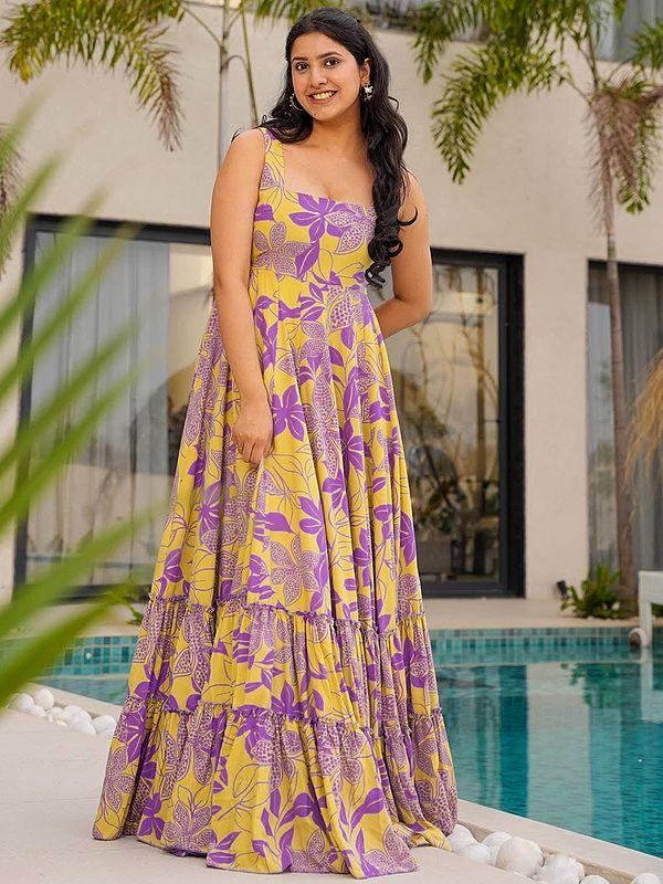 exotic india Sandy-Yellow Elegant Heavy Rayon Sleeveless Floral Print Flared Casual Wear Gown 