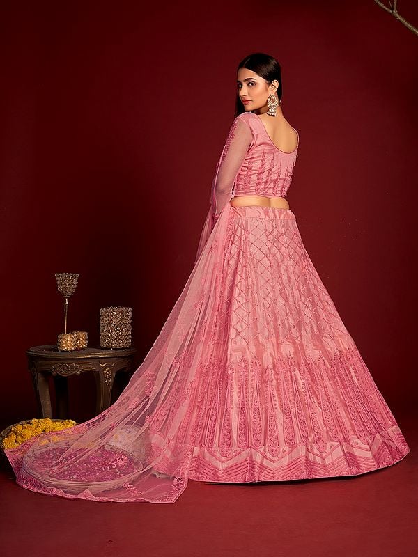 Exotic India Sea-Pink Embroidery Thread Work Designer Wedding Wear Net Lehenga Choli With Matching Dupatta