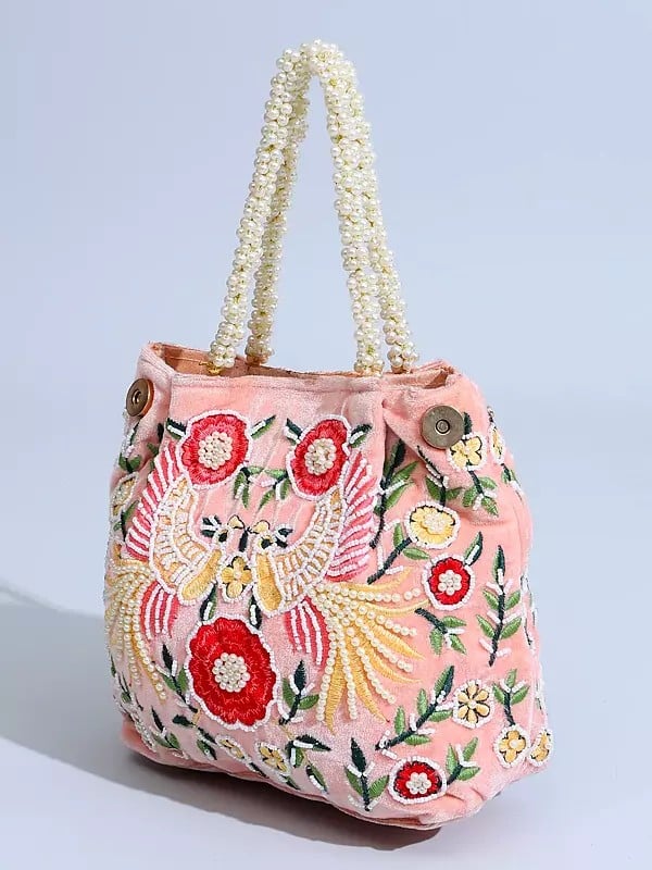 Exotic India Seashell-Pink Velvet Bird Embroidered Hand Bag With Beads Work 