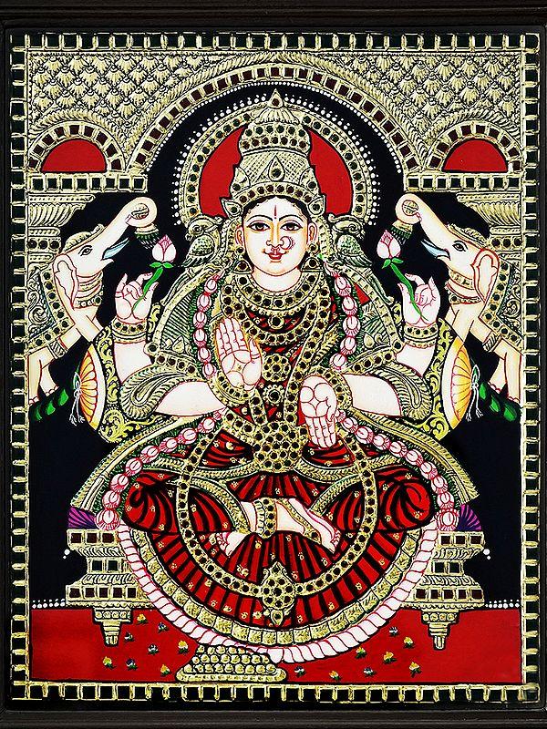 Exotic India Seated Goddess Gaja Lakshmi Tanjore Painting With Frame | Traditional Colour With 24 Karat Gold