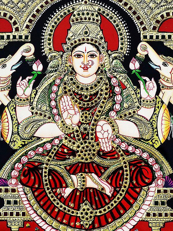 Exotic India Seated Goddess Gaja Lakshmi Tanjore Painting With Frame | Traditional Colour With 24 Karat Gold