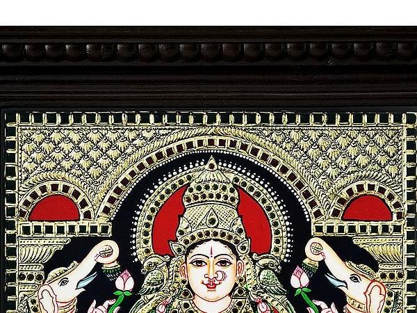 Exotic India Seated Goddess Gaja Lakshmi Tanjore Painting With Frame | Traditional Colour With 24 Karat Gold