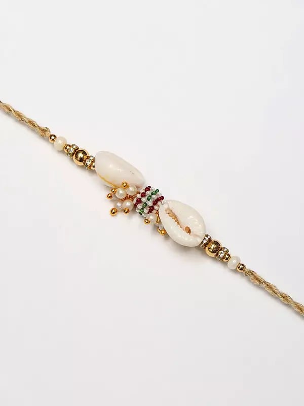 Exotic India Shell Design And White Pearl Beaded Bhaiya Bhabhi Rakhi 
