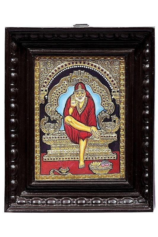 exotic india Shirdi Sai Baba Tanjore Painting | Traditional Colors With Gold | Teakwood Frame | Gold & Wood | Handmade | Made In India