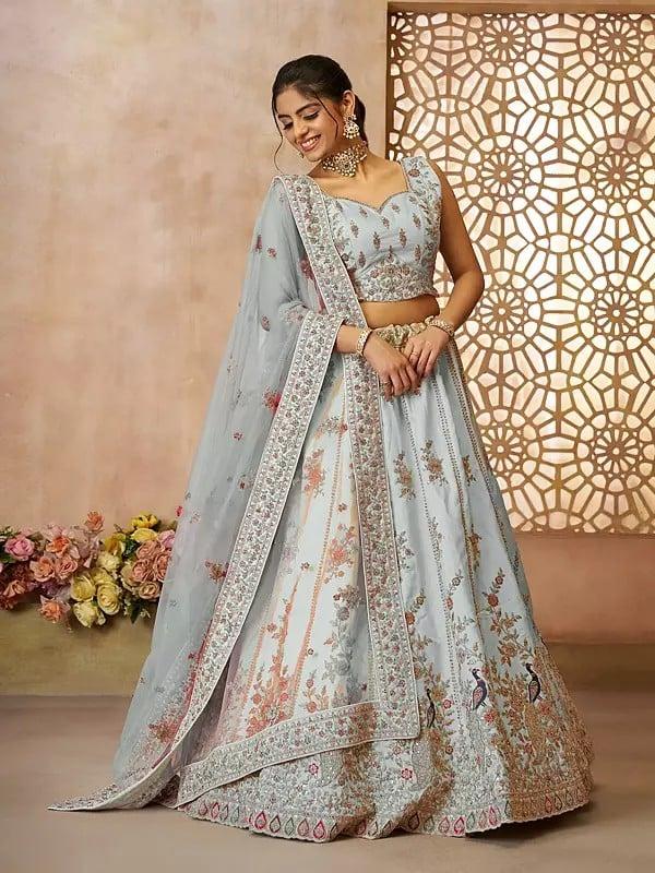 Exotic India Silk Thread Embroidery And Sequins Zari Work Peacock Motifs Lehenga Choli With Net Dupatta 