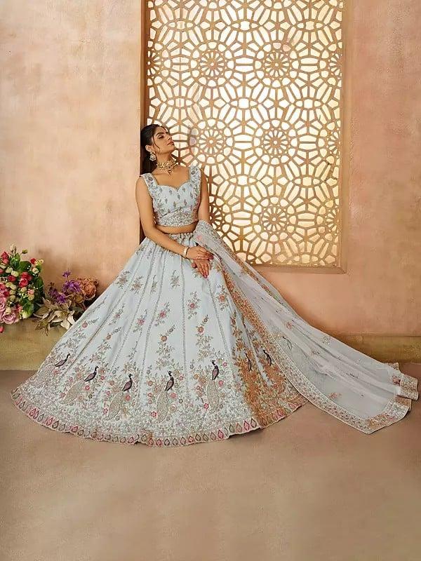 Exotic India Silk Thread Embroidery And Sequins Zari Work Peacock Motifs Lehenga Choli With Net Dupatta 