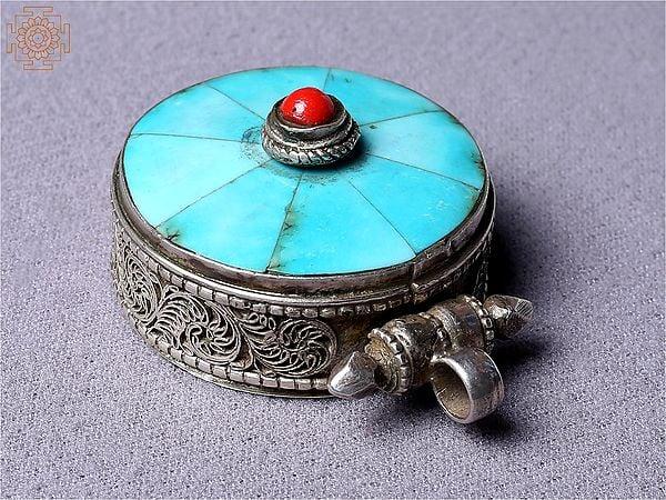 Exotic India Silver Blue Ghau Pendant | Turquoise Stone Jewelry