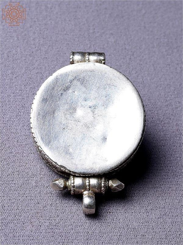 Exotic India Silver Blue Ghau Pendant | Turquoise Stone Jewelry