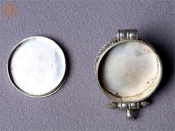 Exotic India Silver Blue Ghau Pendant | Turquoise Stone Jewelry
