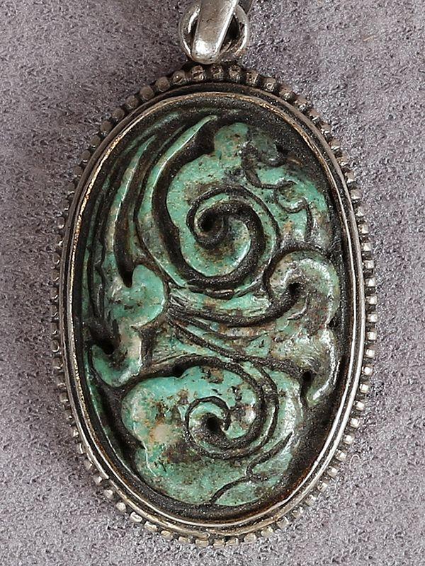 Exotic India Silver Figure Pendant With Emerald Stone 