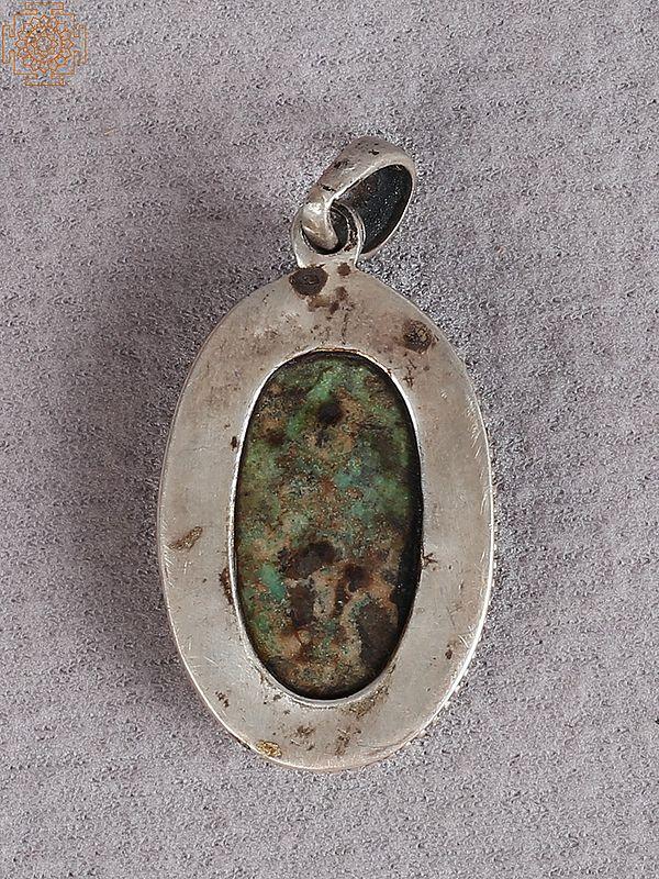 Exotic India Silver Figure Pendant With Emerald Stone 