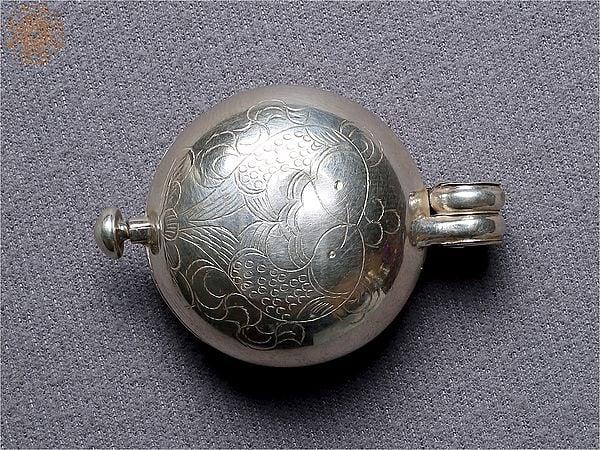 Exotic India Silver Ghau Pendant With Matsyayugma Symbol