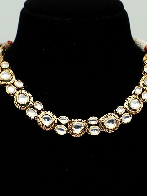 Exotic India Single Layer Stunning Necklace Set With Beautiful Earrings And Kundan Stone