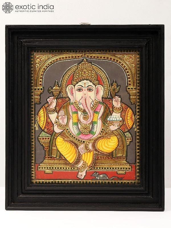 exotic india Sitting Lord Ganapati Tanjore Painting | With Frame