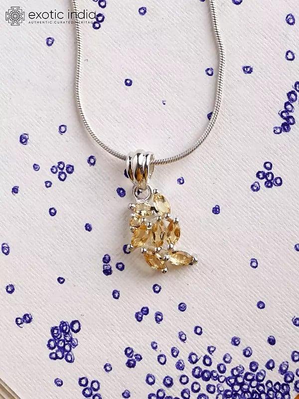 exotic india Small Sterling Silver Pendant with Faceted Citrine 