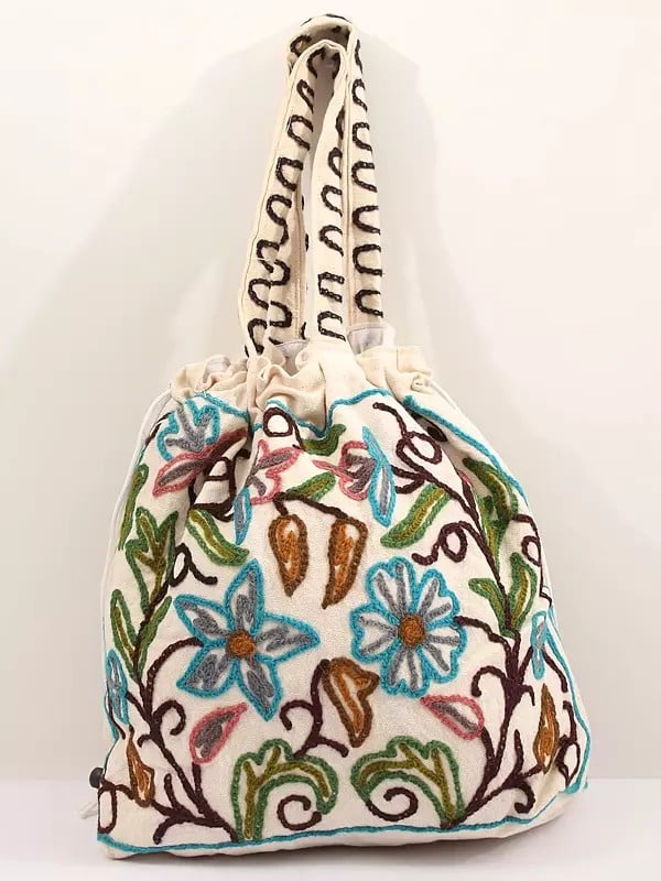 Exotic India Snow-White Cotton Shoulder Bag With Crewel Embroidered Flowers 