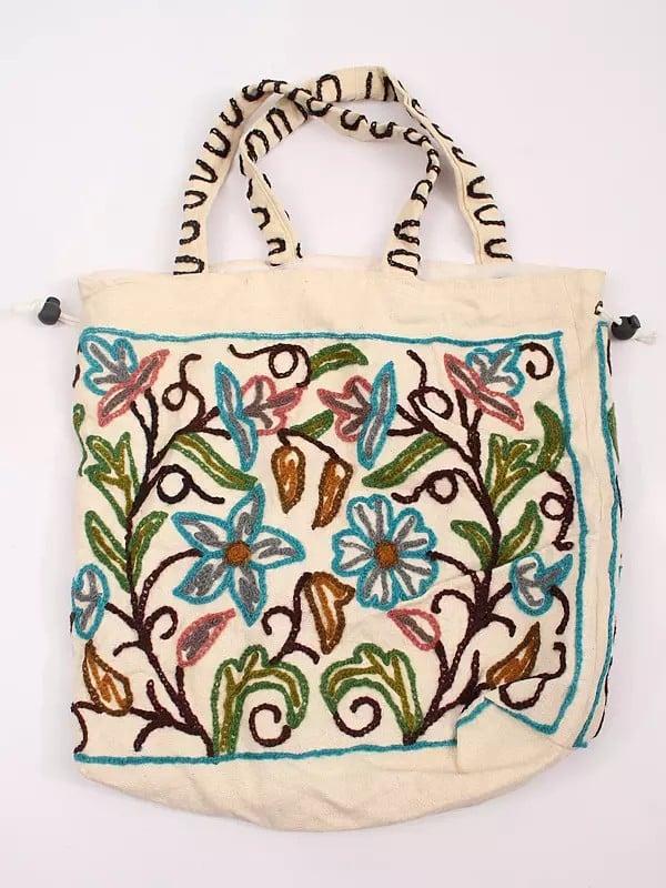 exotic india Snow-White Cotton Shoulder Bag with Crewel Embroidered Flowers 