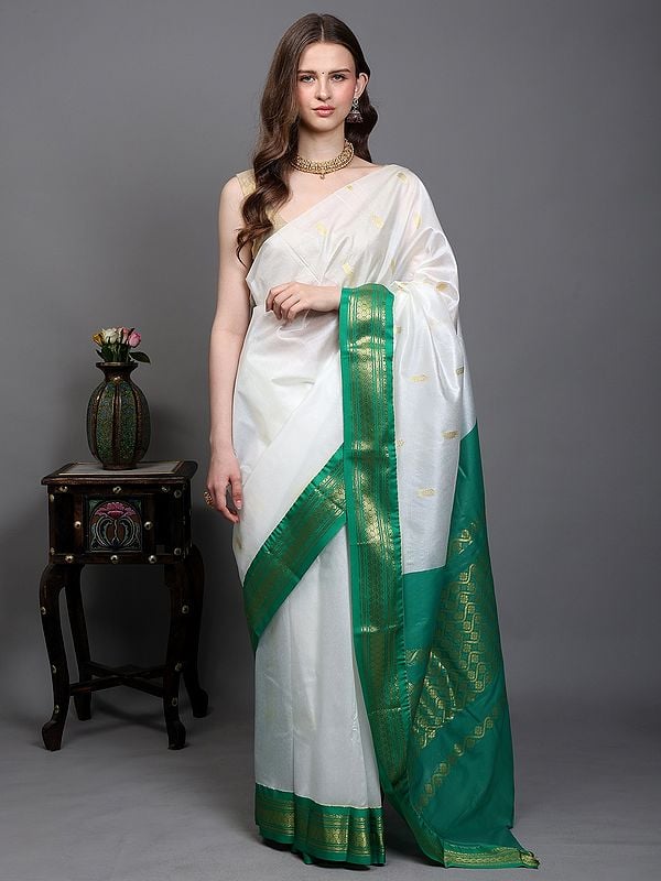 exotic india Snow-White Temple Saree with Zari Woven Motifs and Contrast Pallu-Border from Kumbakonam 