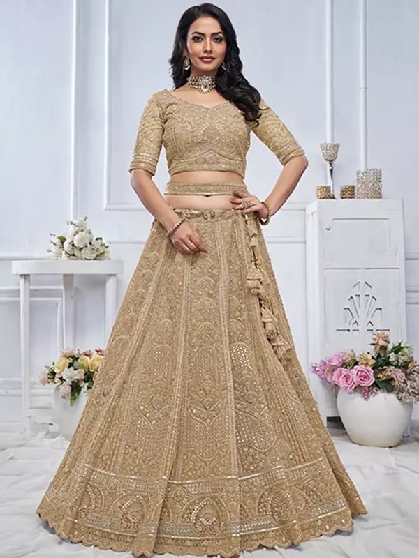 Exotic India Soft Net Heavy Embroidered Bridal Lehenga Choli With Tassels And Matching Dupatta 