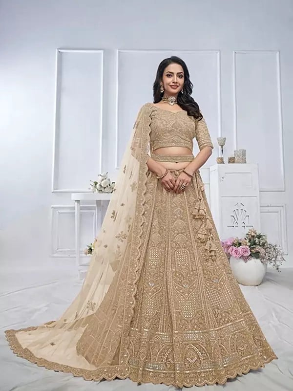 exotic india Soft Net Heavy Embroidered Bridal Lehenga Choli With Tassels And Matching Dupatta 