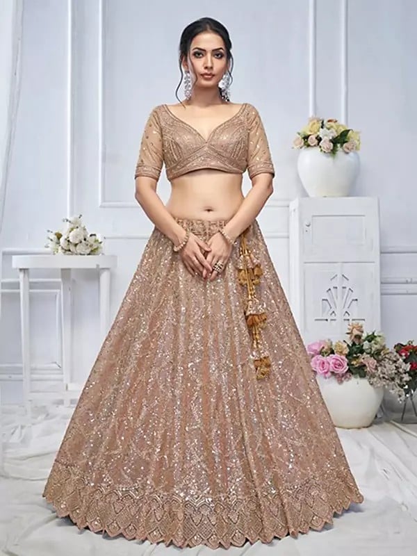 Exotic India Soft Net Sequins Work Wedding Wear Embellished Lehenga Choli With Dori Tassels And Matching Dupatta 