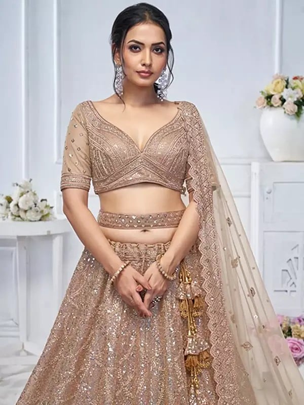 Exotic India Soft Net Sequins Work Wedding Wear Embellished Lehenga Choli With Dori Tassels And Matching Dupatta 