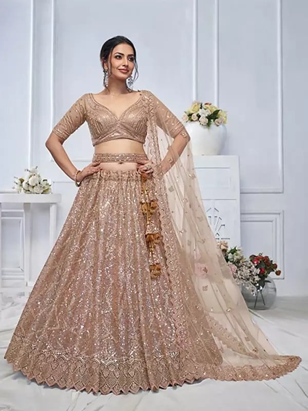 exotic india Soft Net Sequins Work Wedding Wear Embellished Lehenga Choli With Dori Tassels And Matching Dupatta 