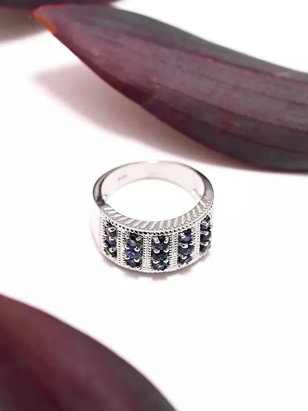 Exotic India Sterling Silver Band Ring With Faceted Blue Sapphire 