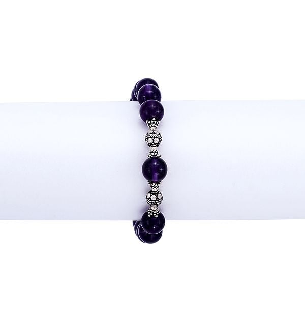 Exotic India Sterling Silver Bracelet With Amethyst Stone