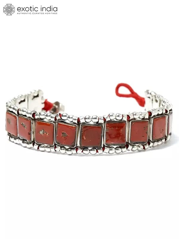 Exotic India Sterling Silver Bracelet With Square Cut Coral 