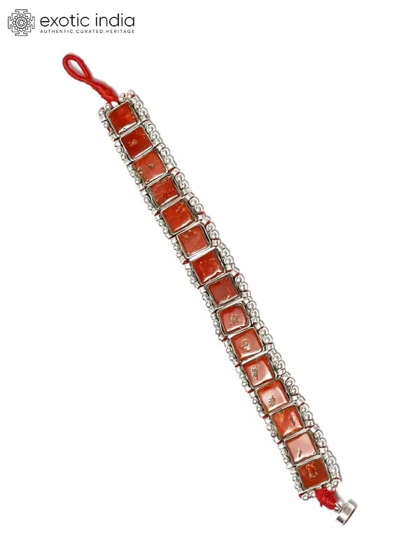 Exotic India Sterling Silver Bracelet With Square Cut Coral 