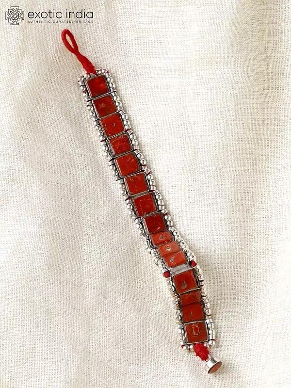 Exotic India Sterling Silver Bracelet With Square Cut Coral 