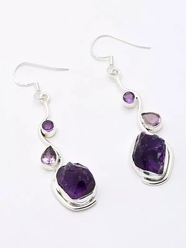 Exotic India Sterling Silver Dangle Earrings With Raw Gemstone