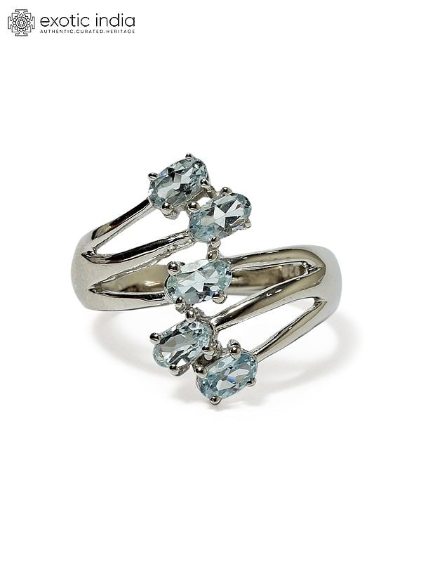 Exotic India Sterling Silver Designer Ring With Faceted Blue Topaz 