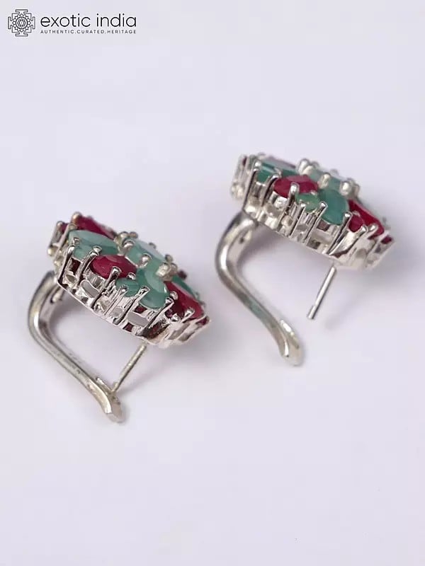 Exotic India Sterling Silver Earrings With Ruby And Emerald