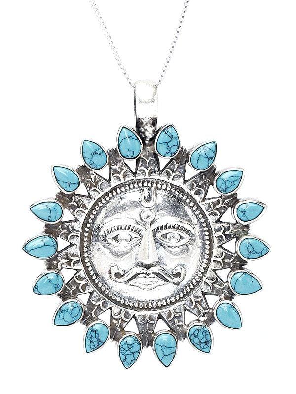 Exotic India Sterling Silver Lord Surya Pendant With Tibetan Turquoise Gemstone