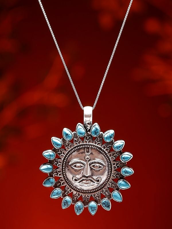 Exotic India Sterling Silver Lord Surya Pendant With Tibetan Turquoise Gemstone