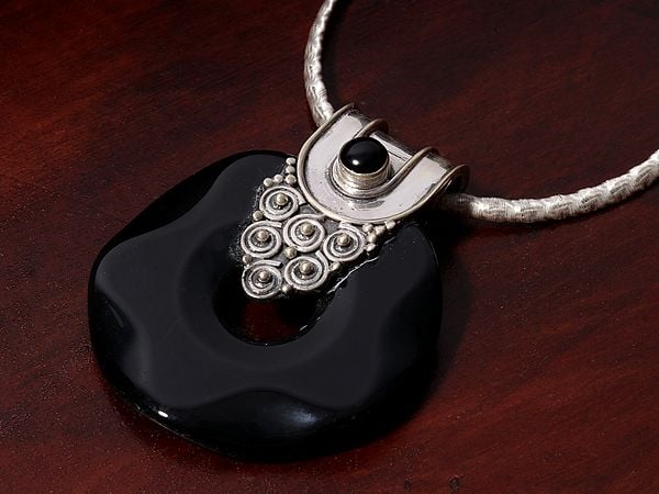 Exotic India Sterling Silver Pendant With Black Onyx Stone