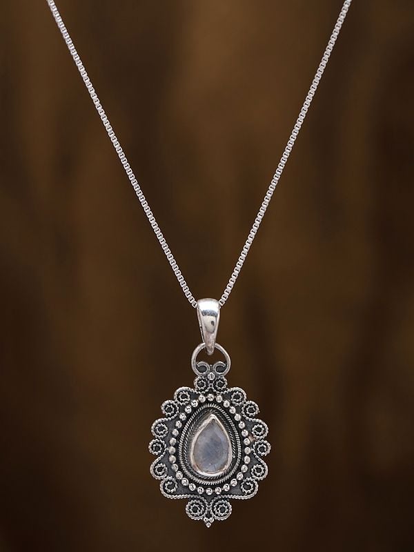Exotic India Sterling Silver Pendant With Tear-drop Shape Rainbow Moonstone 