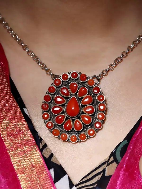 Exotic India Sterling Silver Pendant With Teardrop Shape Coral Gemstones 