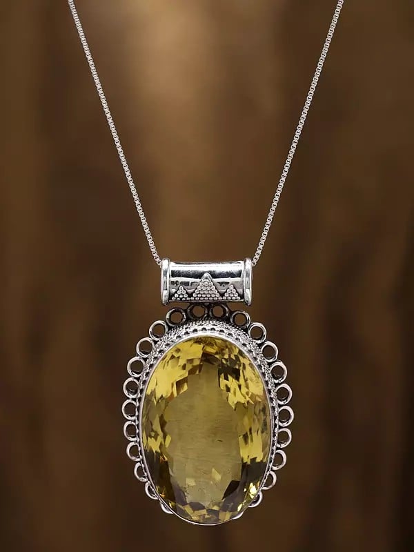 Exotic India Sterling Silver Rawa Work Pendant With Oval Lemon Quartz Gemstone 