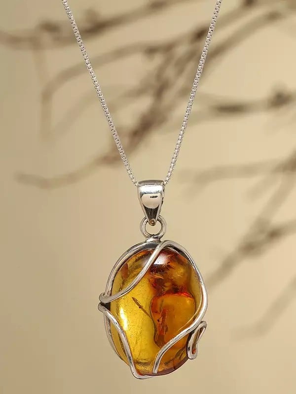 exotic india Sterling Silver Wire Wrapped Baltic Amber Pendant 