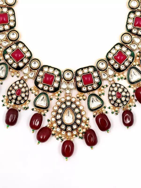 Exotic India Stone And Kundan Studded Necklace Set With Earrings And Mangtika