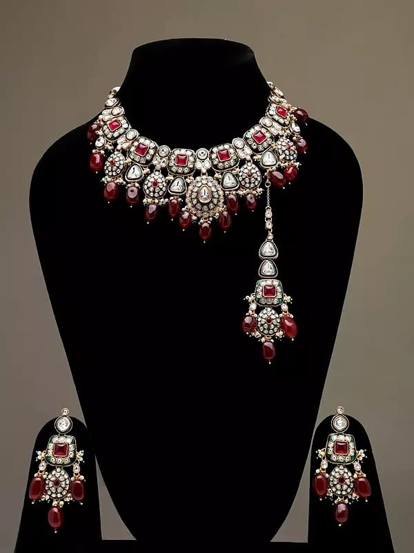 exotic india Stone and Kundan Studded Necklace Set with Earrings and Mangtika 