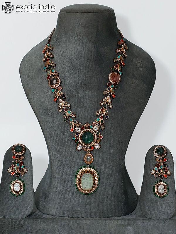 exotic india Stone Floral Design Long Studded Necklace Set With Earrings