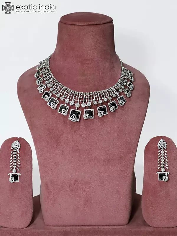exotic india Stone Studded American Diamond Necklace Set With Leaf Design Earrings 