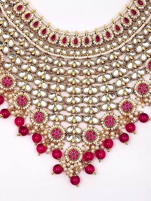 Exotic India Stone Studded And Beaded Choker Necklace Set With Mangtika And Earrings With Chain
