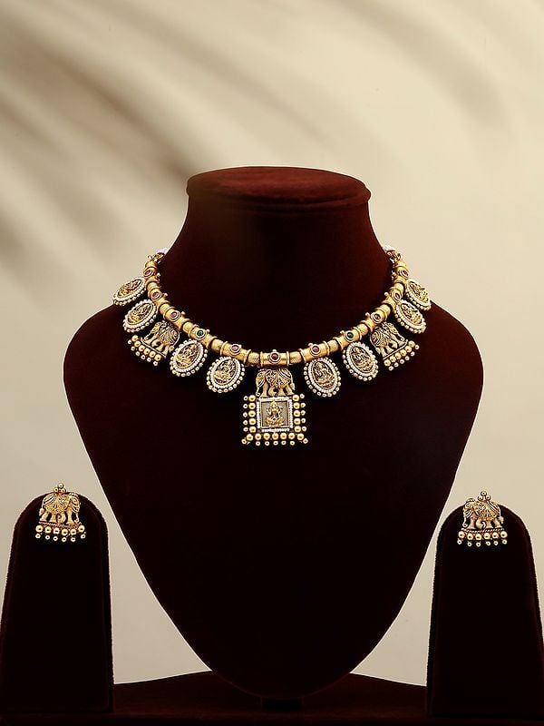 exotic india Stone Studded and Beaded Goddess Lakshmi Necklace Set with Earrings 