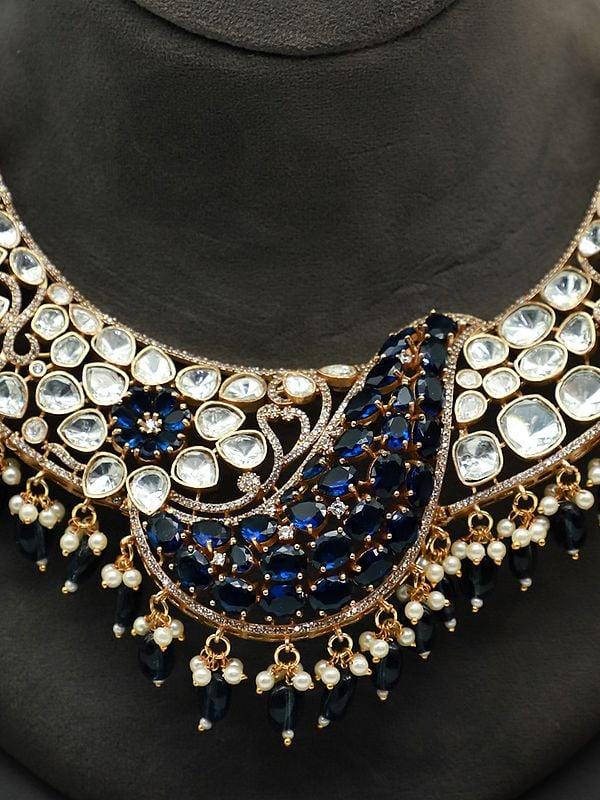 Exotic India Stone Studded And Beaded Moissanite Kundan With Matt Polish Necklace With Floral Beaded Earrings