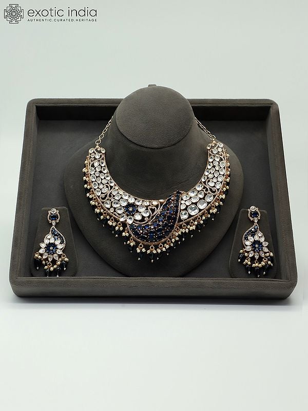 exotic india Stone Studded And Beaded Moissanite Kundan With Matt Polish Necklace With Floral Beaded Earrings